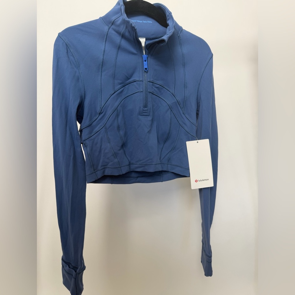 Define cropped half zip